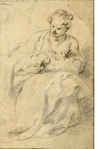 A Woman Holding A Swaddled Baby